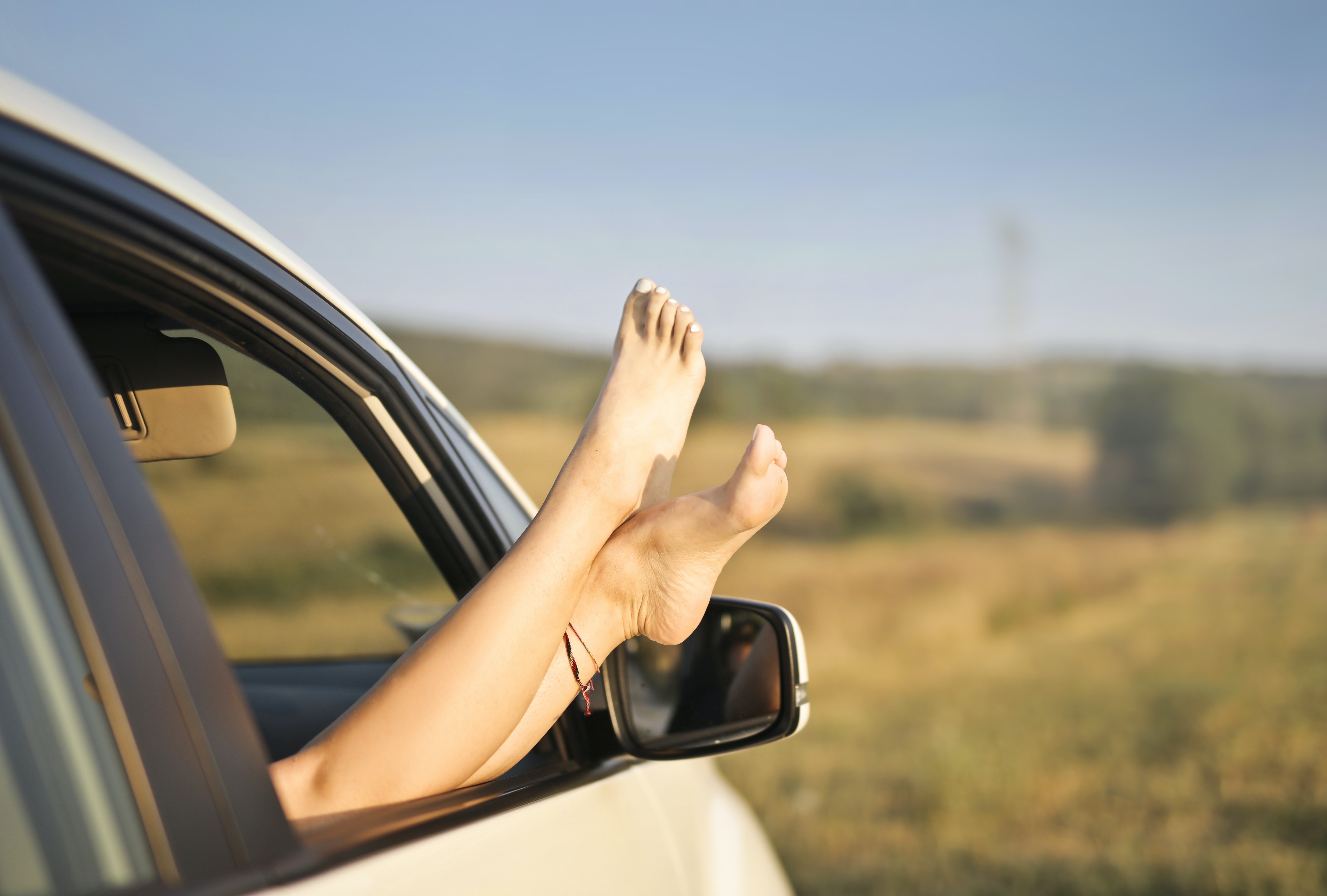 a smooth leg out of car's window